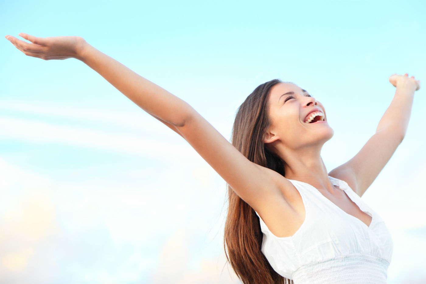 girl feeling great with hands in the air
