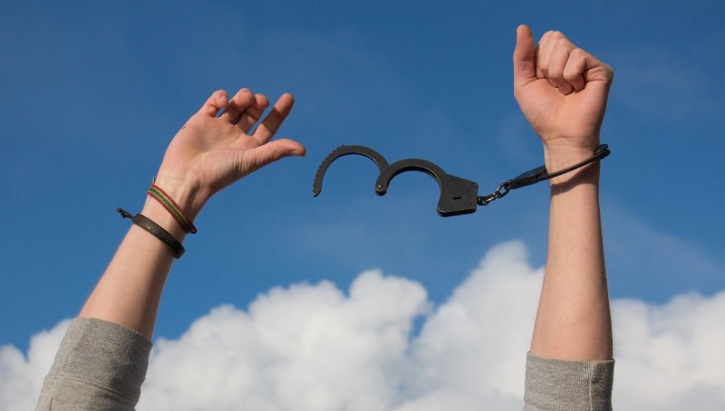 hands unbound from addiction