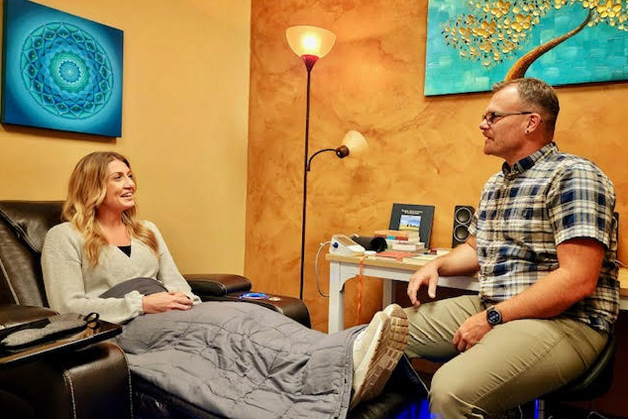 Patient talking with therapist using Ketamine Assisted Therapy